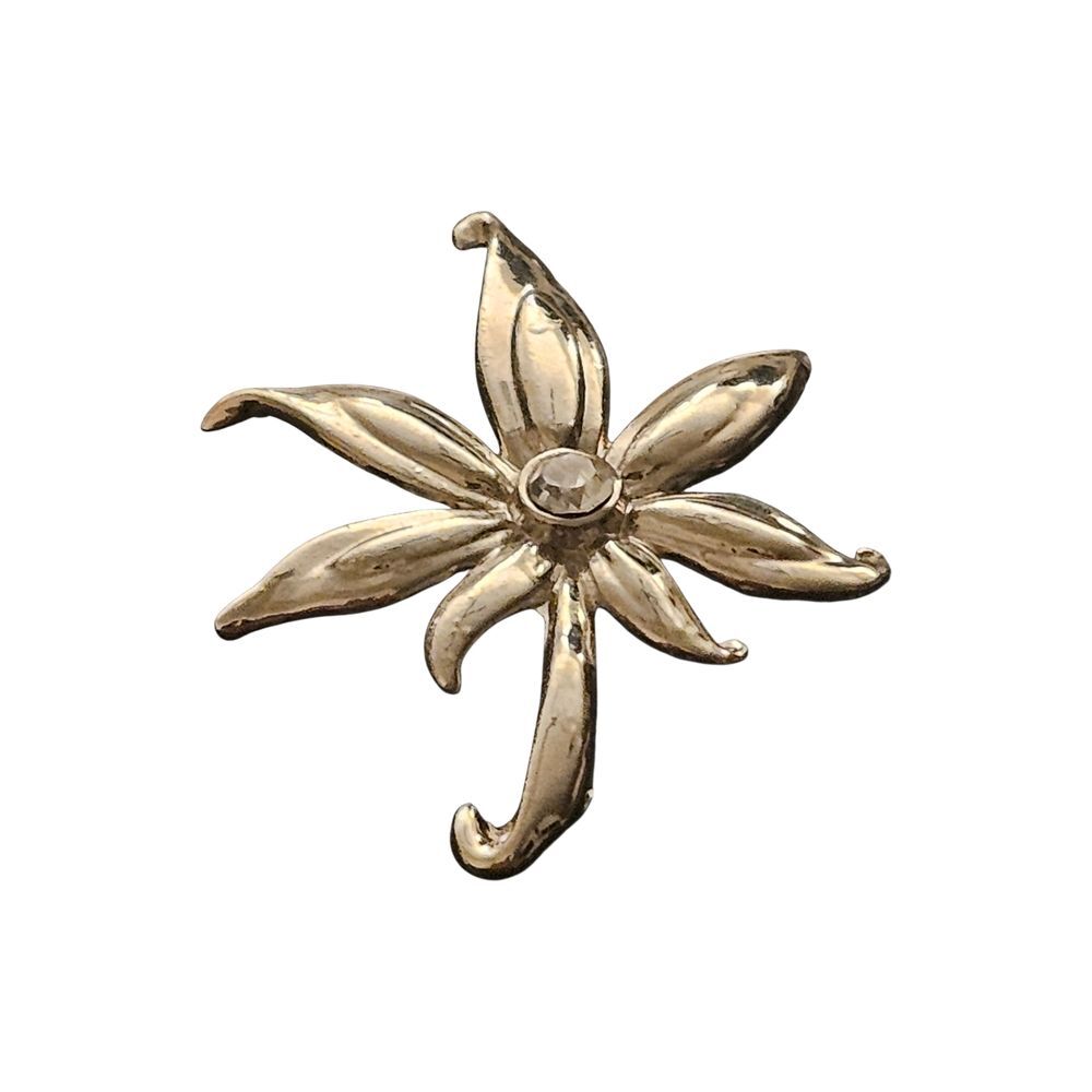 vintage gold-tone flower brooch with a clear rhinestone